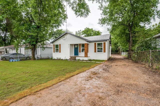 4131 Opal Ave, Dallas, TX 75216 - view of front facade with driveway and a shingled roof