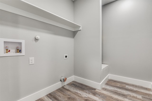 4131 Opal Ave, Dallas, TX 75216 - laundry room with hookup for an electric dryer, washer hookup, and wood finished floors