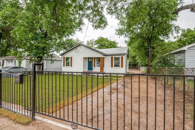 4131 Opal Ave, Dallas, TX 75216 - ranch-style home featuring a fenced front yard and roof with shingles