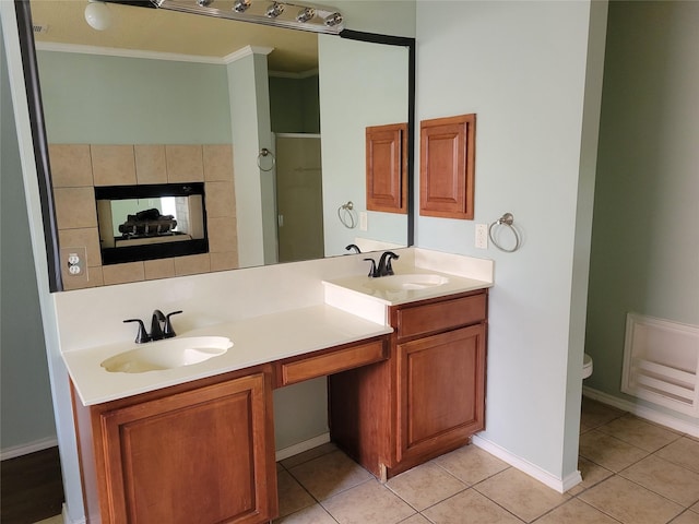 2001 Mark Twain Ln, Denton, TX 76210 - bathroom with ornamental molding, double vanity, tile patterned floors, and a shower