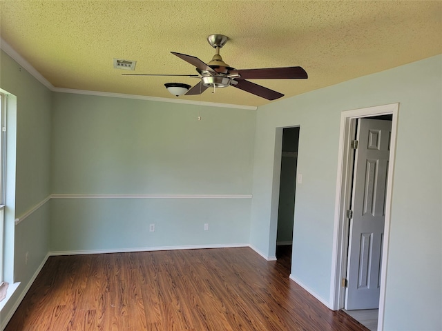 2001 Mark Twain Ln, Denton, TX 76210 - spare room with ceiling fan, wood finished floors, and a textured ceiling