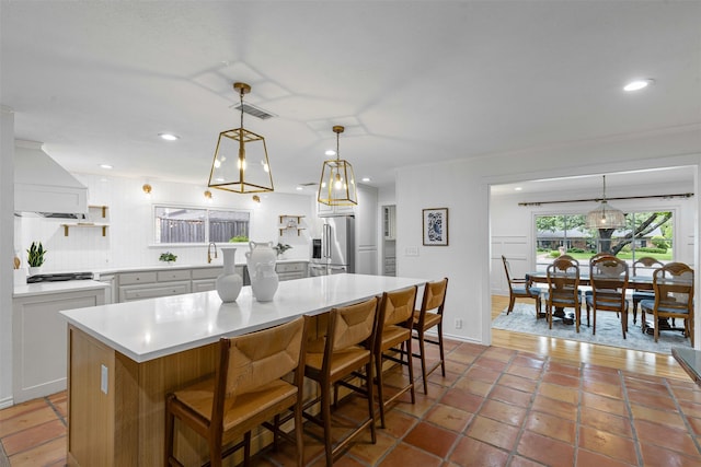 6805 Benito Ct, Fort Worth, TX 76126 - kitchen with premium range hood, stainless steel appliances, open shelves, light countertops, and recessed lighting