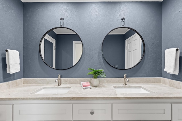 6805 Benito Ct, Fort Worth, TX 76126 - bathroom featuring double vanity and a textured wall