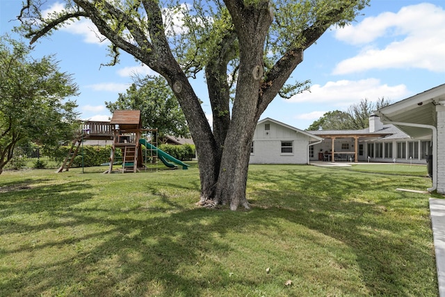6805 Benito Ct, Fort Worth, TX 76126 - view of green lawn with a playground and a patio area