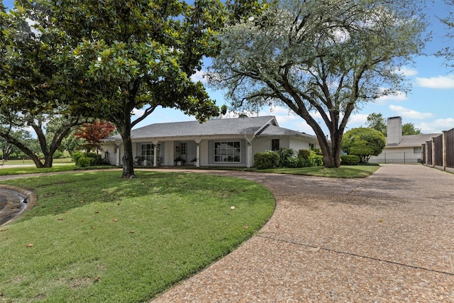 6805 Benito Ct, Fort Worth, TX 76126 - ranch-style home with curved driveway and a porch