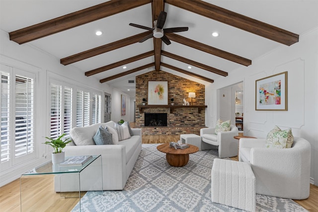 6805 Benito Ct, Fort Worth, TX 76126 - living area featuring wood finished floors, ceiling fan, a brick fireplace, and recessed lighting