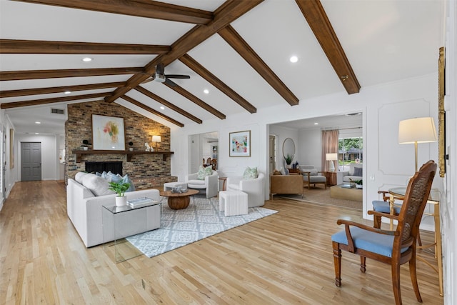 6805 Benito Ct, Fort Worth, TX 76126 - living room with light wood finished floors, recessed lighting, a fireplace, and a ceiling fan