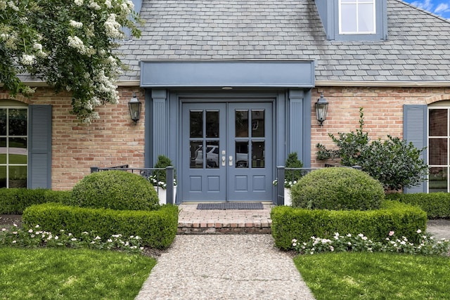 6710 Meadowcreek Dr, Dallas, TX 75254 - property entrance with a high end roof, french doors, and brick siding