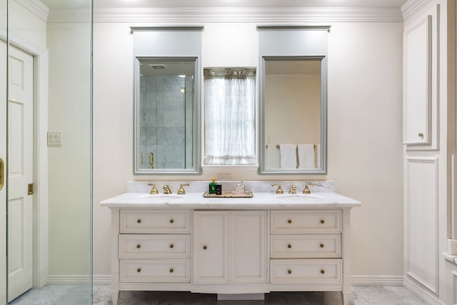 6710 Meadowcreek Dr, Dallas, TX 75254 - bathroom featuring marble look tile flooring, double vanity, and crown molding