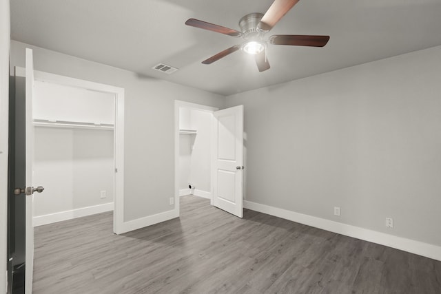 3624 Baylor St, Fort Worth, TX 76119 - unfurnished bedroom with wood finished floors, ceiling fan, and a closet