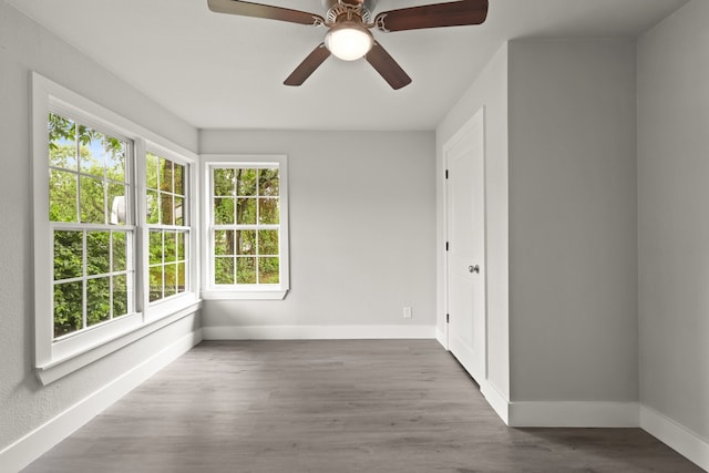 3624 Baylor St, Fort Worth, TX 76119 - empty room featuring ceiling fan and wood finished floors