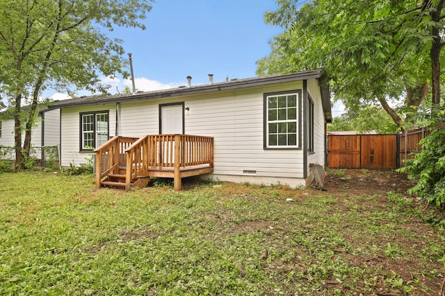 3624 Baylor St, Fort Worth, TX 76119 - back of property with a gate and crawl space