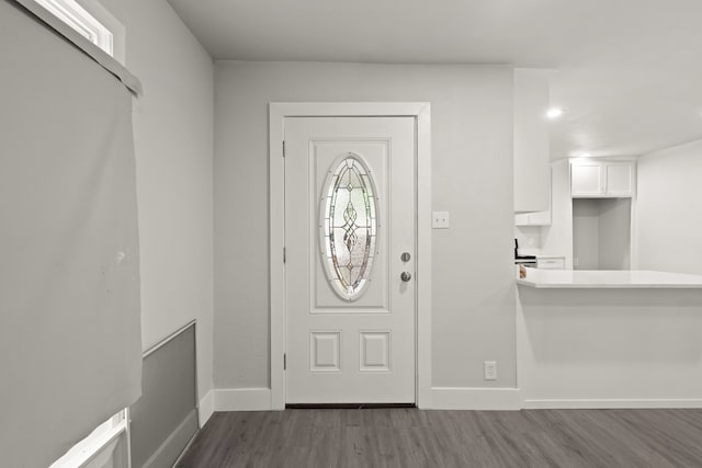 3624 Baylor St, Fort Worth, TX 76119 - entrance foyer featuring dark wood-style floors and baseboards