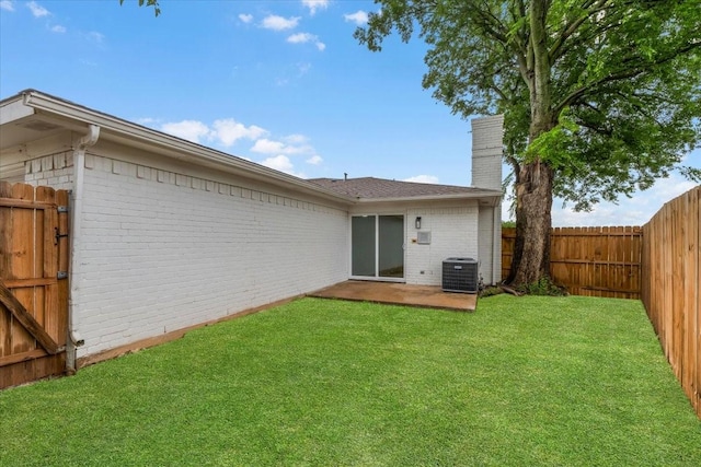 7302 Vista Cliff Dr, Fort Worth, TX 76179 - rear view of property with brick siding, a chimney, a fenced backyard, and a patio area