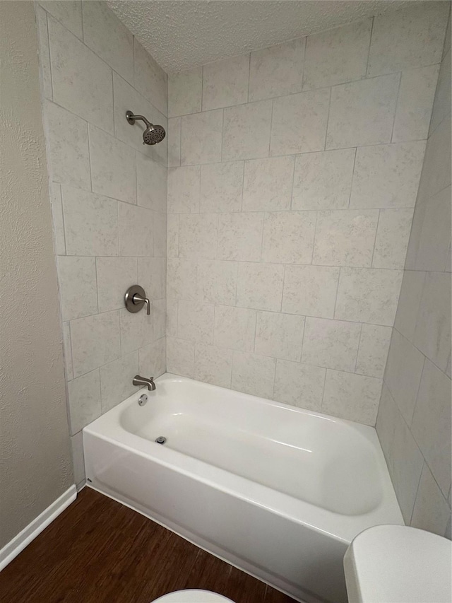 2209 Viewtop Ln Unit 2, Arlington, TX 76012 - bathroom featuring wood finished floors and tub / shower combination