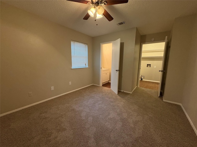 2209 Viewtop Ln Unit 2, Arlington, TX 76012 - unfurnished bedroom featuring dark carpet, a textured ceiling, and ceiling fan