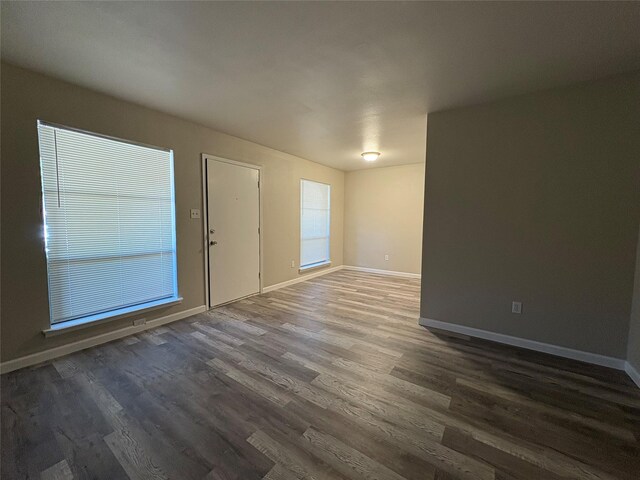 2209 Viewtop Ln Unit 2, Arlington, TX 76012 - unfurnished room with wood finished floors and baseboards