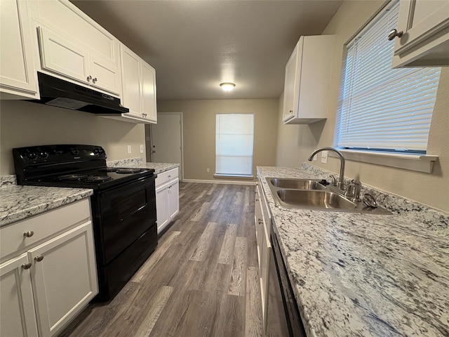 2209 Viewtop Ln Unit 2, Arlington, TX 76012 - kitchen with black range with electric cooktop, under cabinet range hood, dark wood-style flooring, and white cabinetry