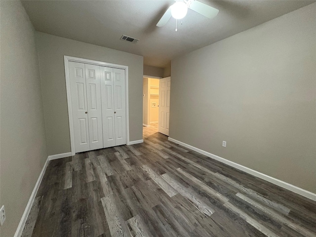 2209 Viewtop Ln Unit 2, Arlington, TX 76012 - unfurnished bedroom featuring dark wood-type flooring, a closet, and a ceiling fan