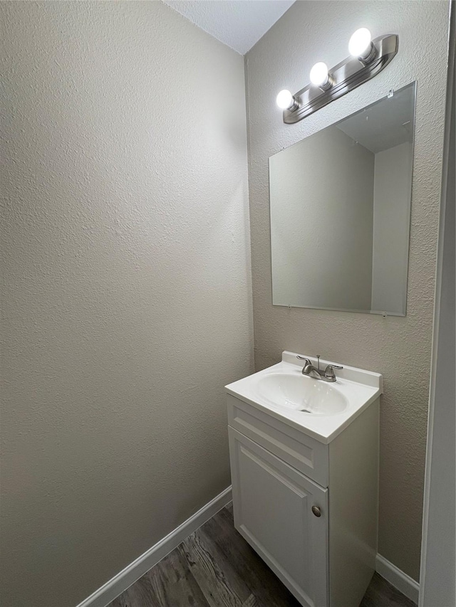 2209 Viewtop Ln Unit 2, Arlington, TX 76012 - bathroom with vanity and wood finished floors