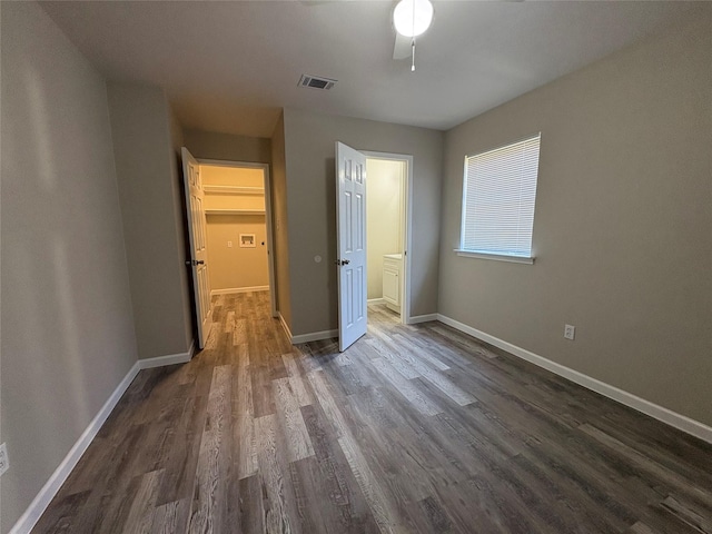 2209 Viewtop Ln Unit 2, Arlington, TX 76012 - unfurnished bedroom with dark wood finished floors and baseboards