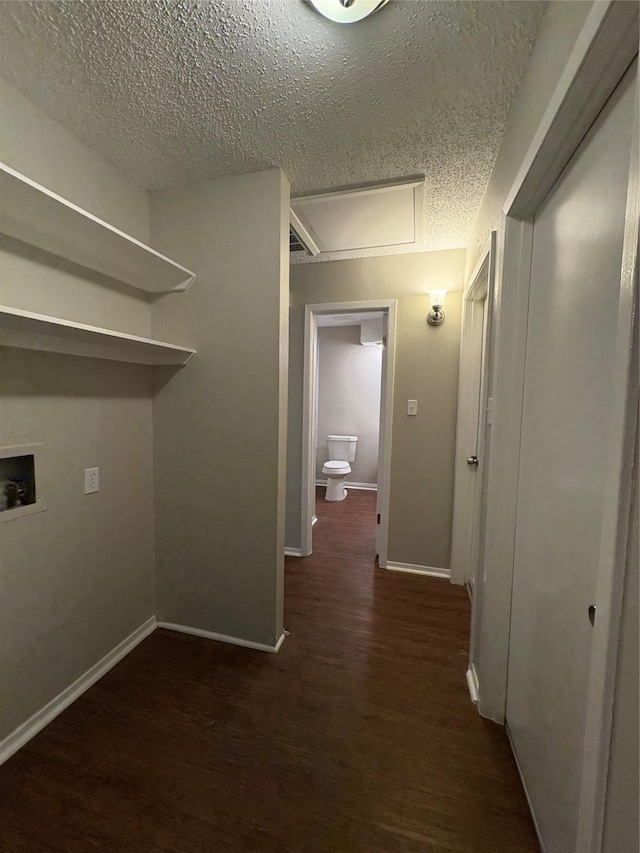 2209 Viewtop Ln Unit 2, Arlington, TX 76012 - laundry room with hookup for a washing machine, wood finished floors, a textured ceiling, and attic access