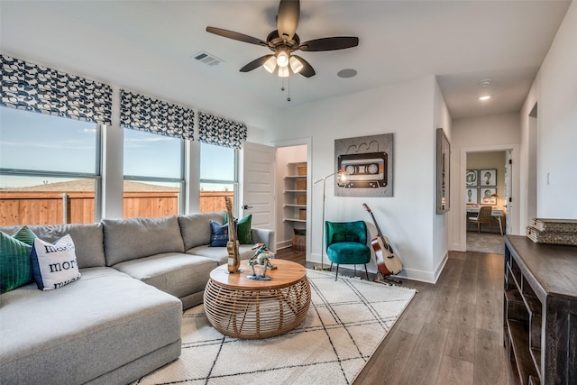 1887 Silver Birch Rd, Waxahachie, TX 75165 - living area featuring wood finished floors and a ceiling fan