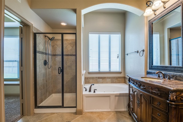 2204 Hartley Dr, Forney, TX 75126 - full bath with a jetted tub, vanity, a shower stall, and tile patterned floors