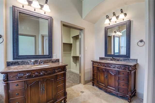 2204 Hartley Dr, Forney, TX 75126 - full bath featuring two vanities and tile patterned floors