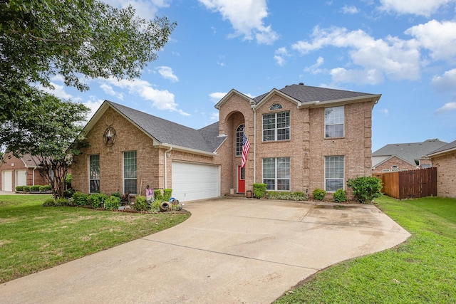 2715 Forest Lake Dr, Grand Prairie, TX 75052 - traditional home with brick siding, an attached garage, concrete driveway, and roof with shingles