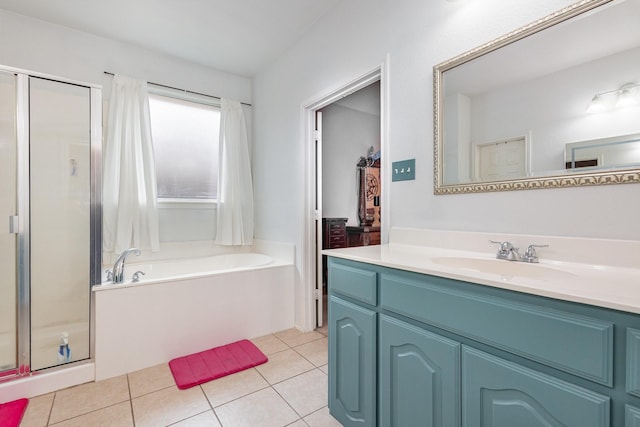 2715 Forest Lake Dr, Grand Prairie, TX 75052 - bathroom featuring a shower stall, a garden tub, vanity, and tile patterned flooring