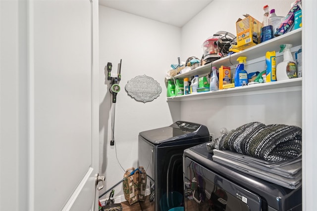 8901 Thompson Rd, Argyle, TX 76226 - washroom with separate washer and dryer and wood finished floors