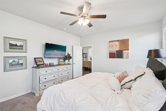 8901 Thompson Rd, Argyle, TX 76226 - carpeted bedroom with baseboards and a ceiling fan