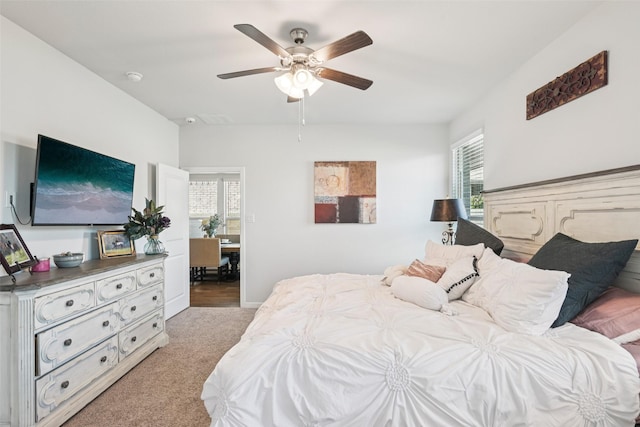 8901 Thompson Rd, Argyle, TX 76226 - bedroom with multiple windows, light colored carpet, and a ceiling fan