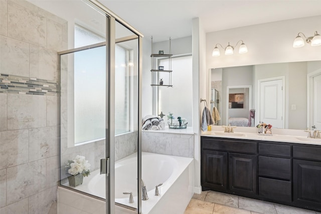 8901 Thompson Rd, Argyle, TX 76226 - ensuite bathroom with a garden tub, a stall shower, double vanity, and plenty of natural light