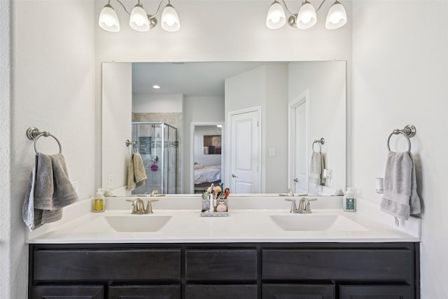8901 Thompson Rd, Argyle, TX 76226 - full bath with double vanity, a shower stall, a chandelier, and connected bathroom