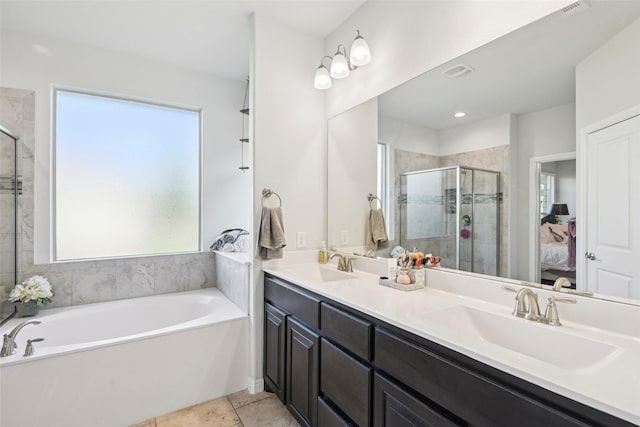 8901 Thompson Rd, Argyle, TX 76226 - ensuite bathroom with plenty of natural light, a bath, a shower stall, and double vanity