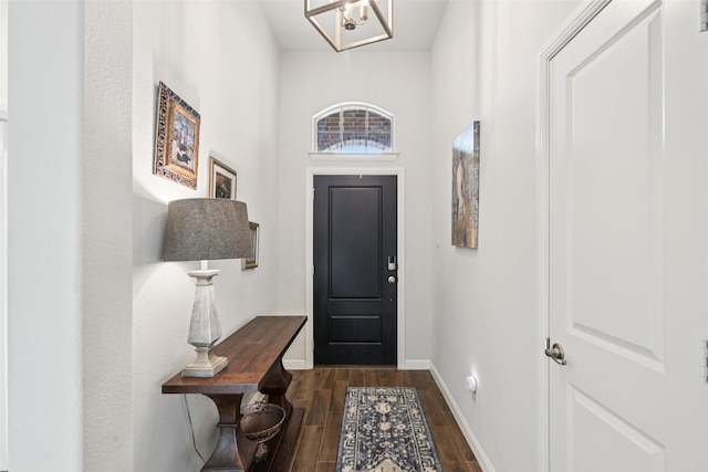 8901 Thompson Rd, Argyle, TX 76226 - foyer entrance with dark wood finished floors and a chandelier