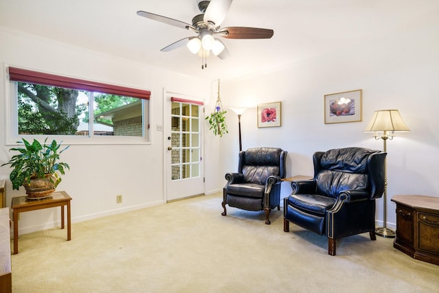 315 Ridgewood Dr, Richardson, TX 75080 - living area with carpet flooring and a ceiling fan