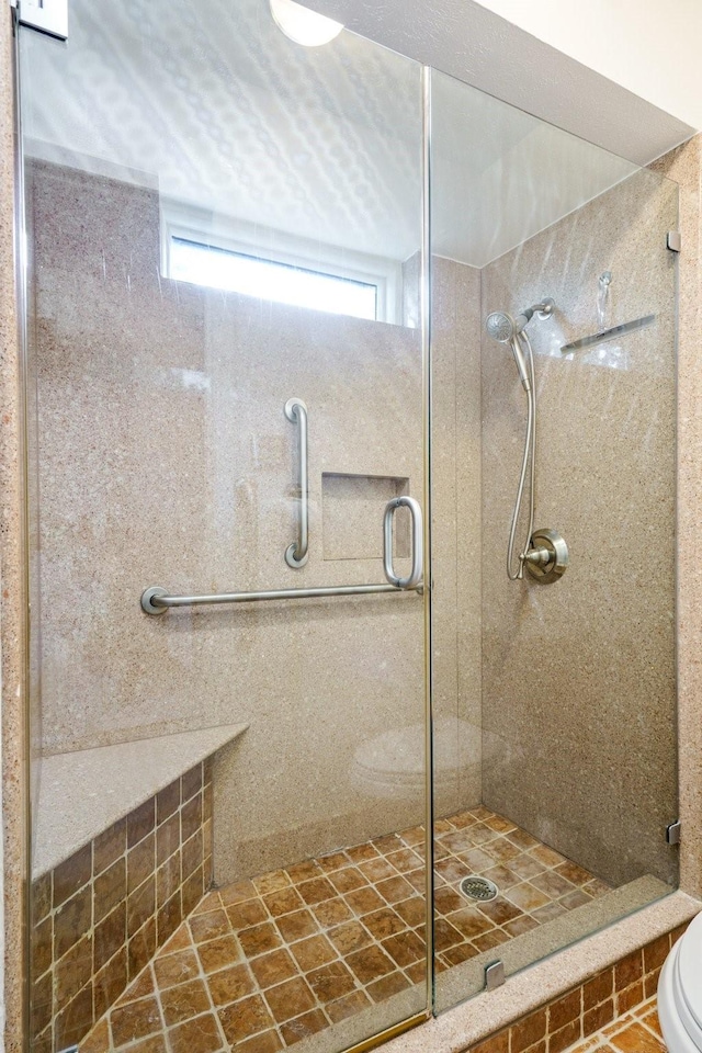 315 Ridgewood Dr, Richardson, TX 75080 - bathroom featuring a shower stall and toilet