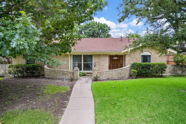 315 Ridgewood Dr, Richardson, TX 75080 - view of front of home with brick siding and roof with shingles
