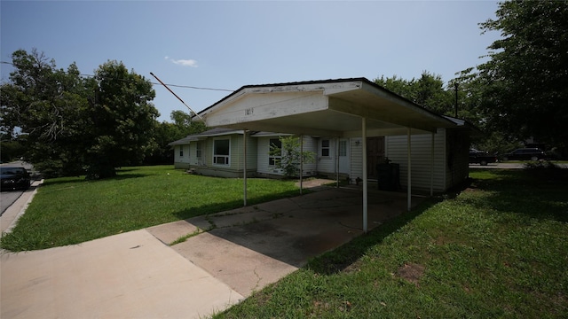 1819 Panhandle St, Denton, TX 76201 - view of property exterior with a yard and concrete driveway