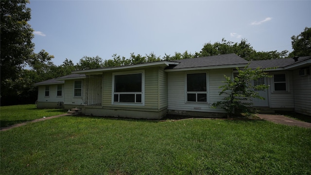 1819 Panhandle St, Denton, TX 76201 - back of house with a yard