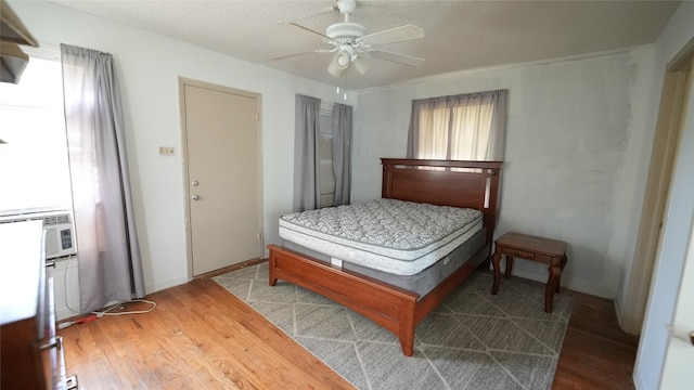 1819 Panhandle St, Denton, TX 76201 - bedroom featuring wood finished floors and ceiling fan
