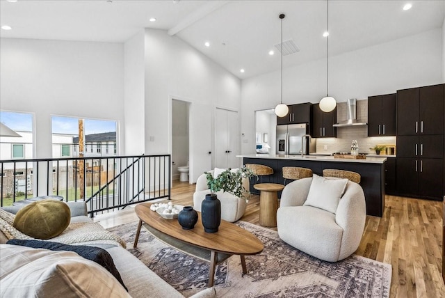 2138 Lovedale Ave Unit 102, Dallas, TX 75235 - living area with high vaulted ceiling, light wood-type flooring, beamed ceiling, and recessed lighting