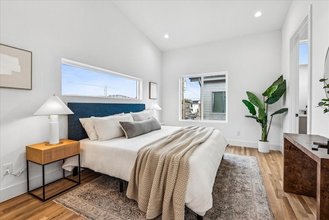 2138 Lovedale Ave Unit 102, Dallas, TX 75235 - bedroom featuring wood finished floors and recessed lighting