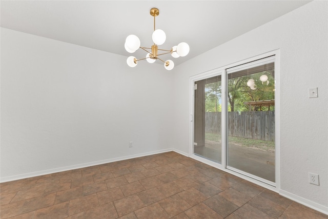 2001 Rey Dr, Woodway, TX 76712 - empty room featuring a chandelier and stone finish floors