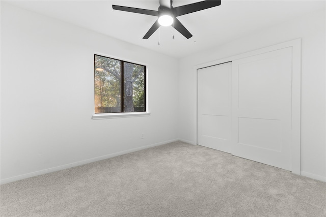 2001 Rey Dr, Woodway, TX 76712 - unfurnished bedroom featuring carpet flooring, a closet, and a ceiling fan