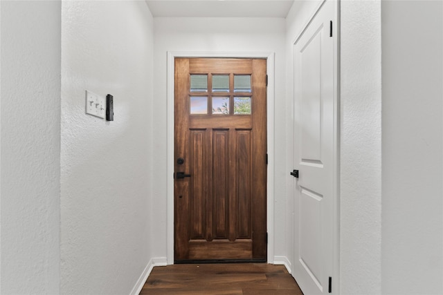 2001 Rey Dr, Woodway, TX 76712 - doorway featuring dark wood-style flooring and a textured wall
