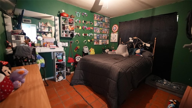 811 Crescent St, Denton, TX 76201 - tiled bedroom featuring a ceiling fan